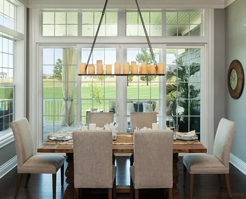 Image of a residential dinning room interior, featuring Pella windows