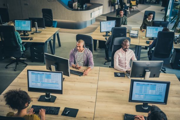 employees working at large tables
